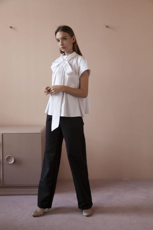MALCOLM SHIRT WORN WITH HIGH-WAISTED PANTS